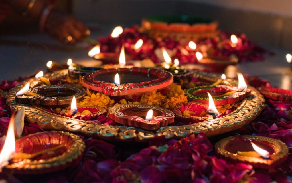 Diyas decorated with marigold flowers for Diwali – festive season property buying in Jaipur