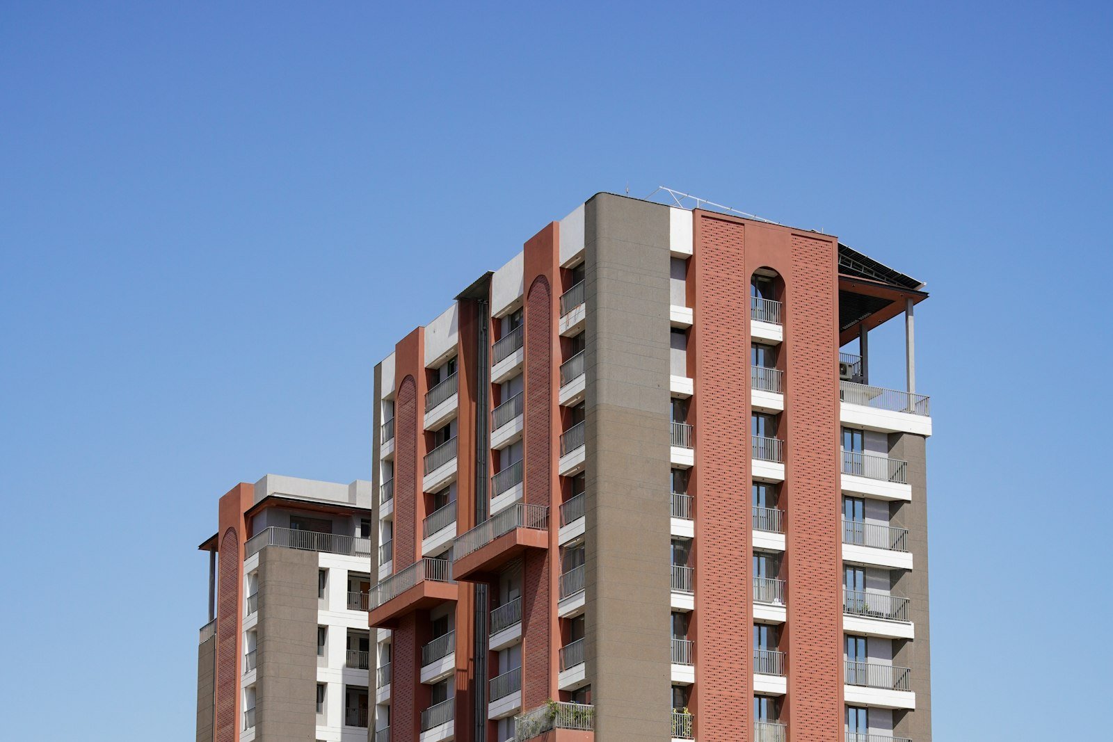 Modern residential apartment buildings – representative image
