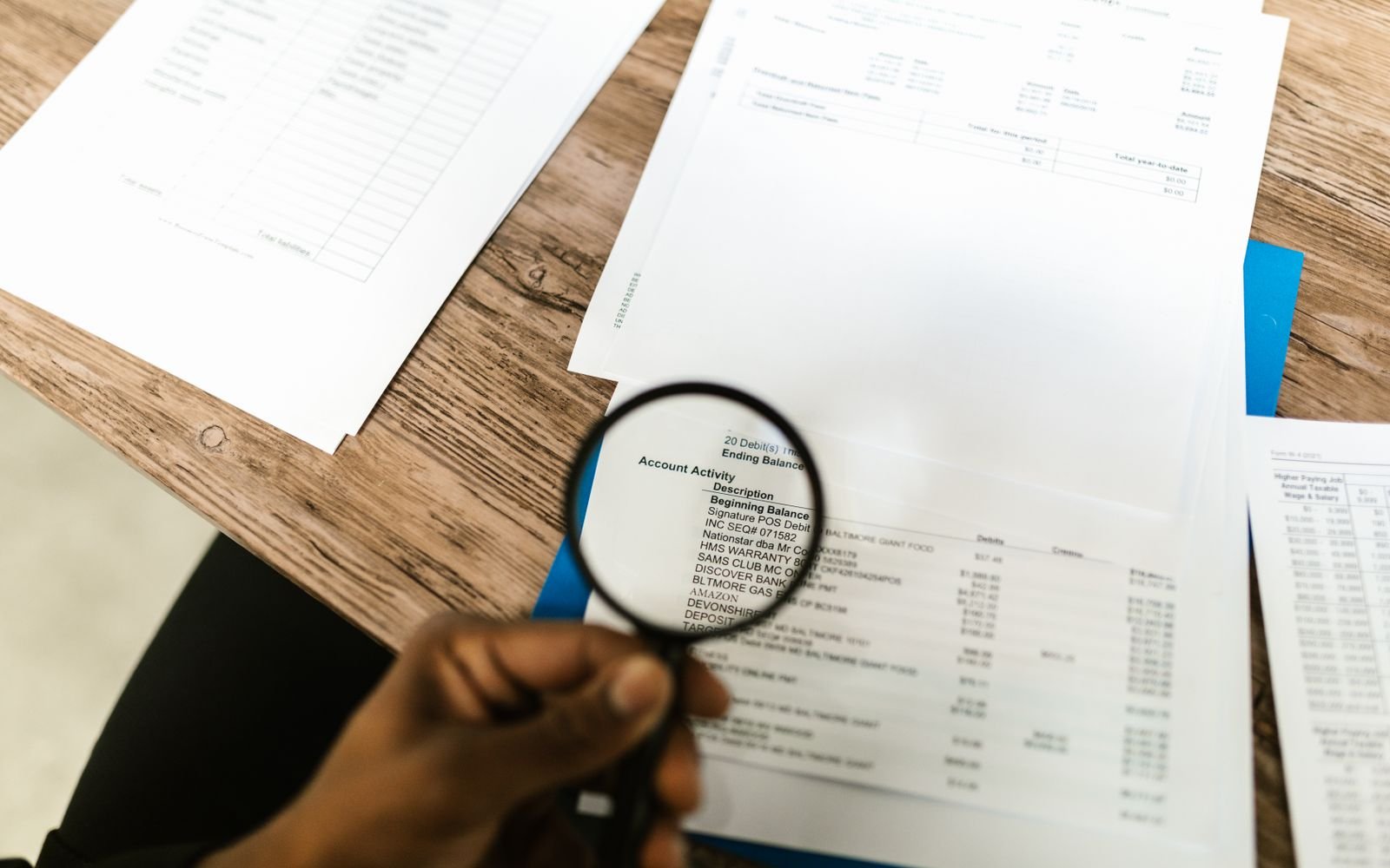Property documents being reviewed before purchase